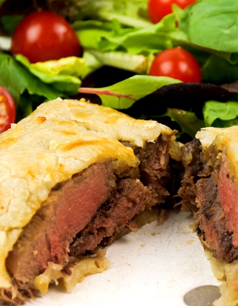 Beef Wellington sliced medium-rare